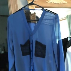 Very nice dress up blouse. Pretty black lace too